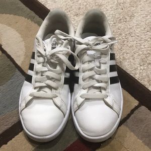 White and black adidas superstars